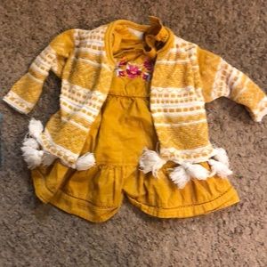 Sleeveless dress and matching sweater set